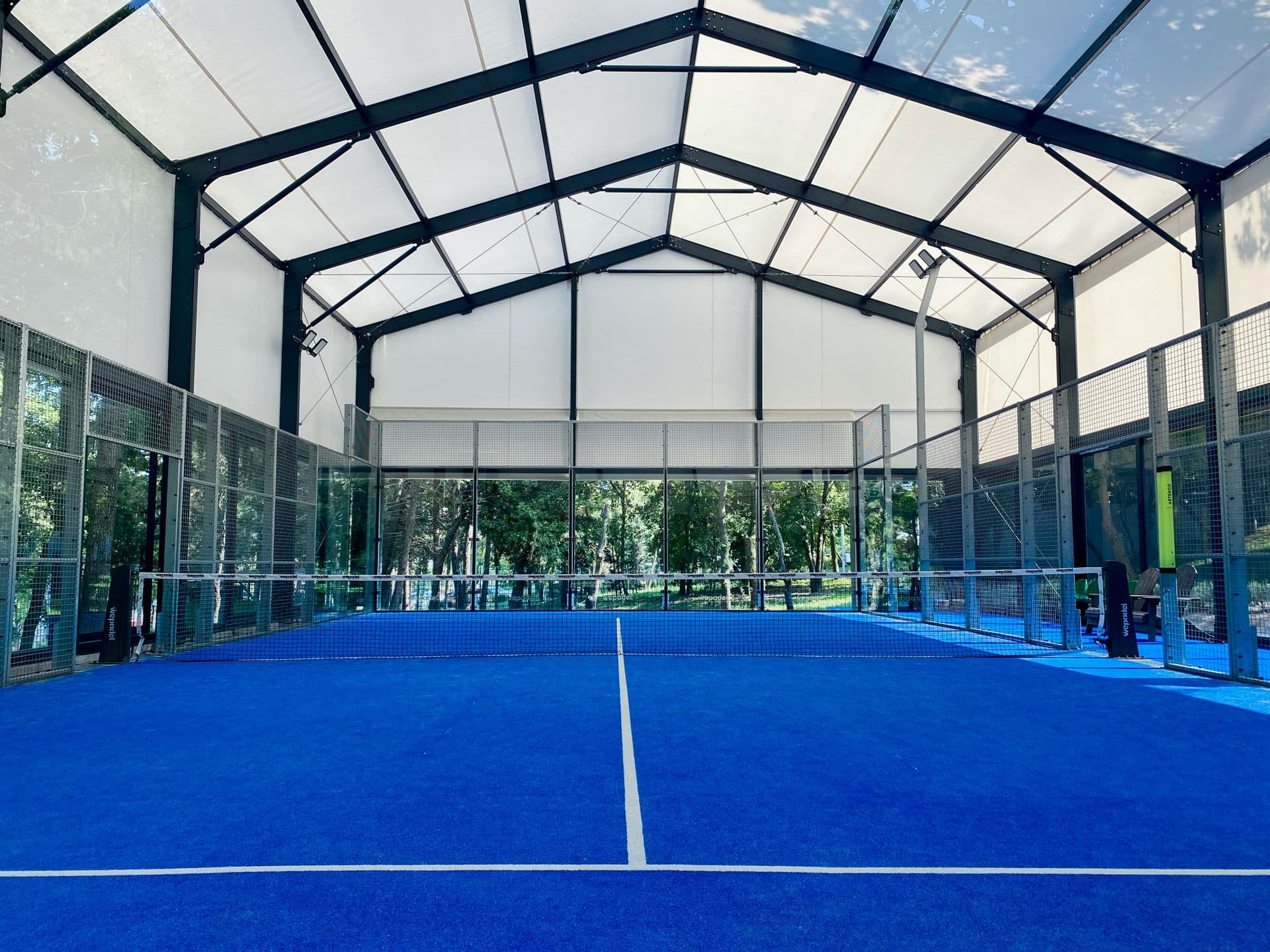 Premium indoor padel court — illustrative photography, not a Courvia venue partner